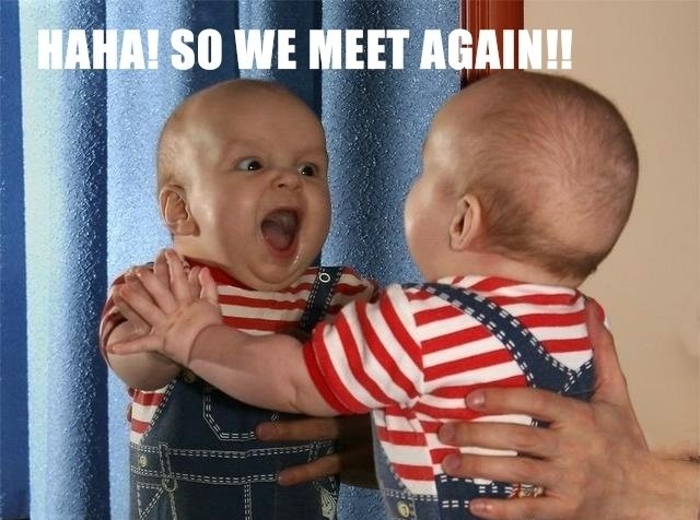 Funny Baby Looks Himself In Mirror