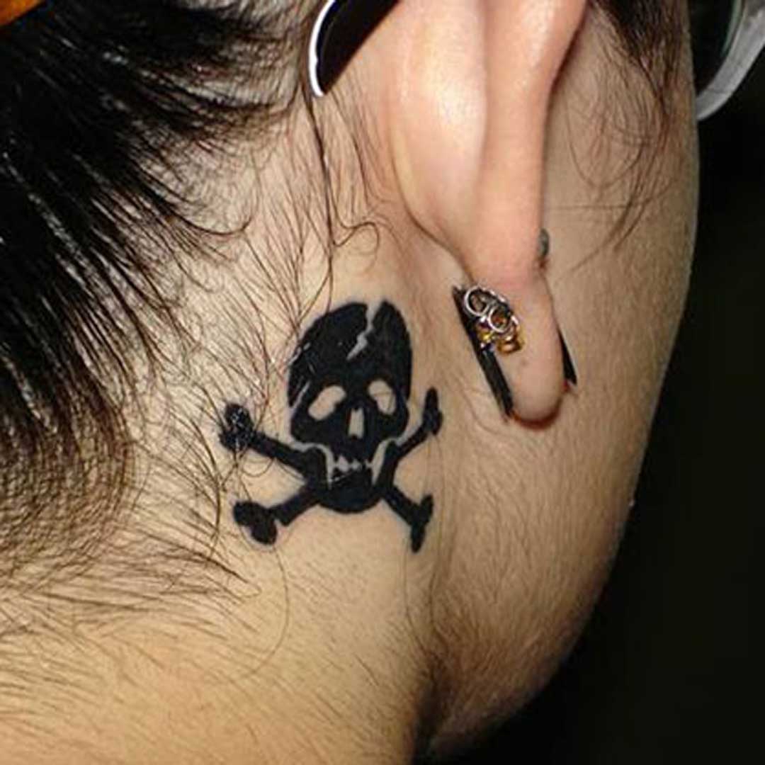 Pirate Skull With Crossbone Girl Tattoo